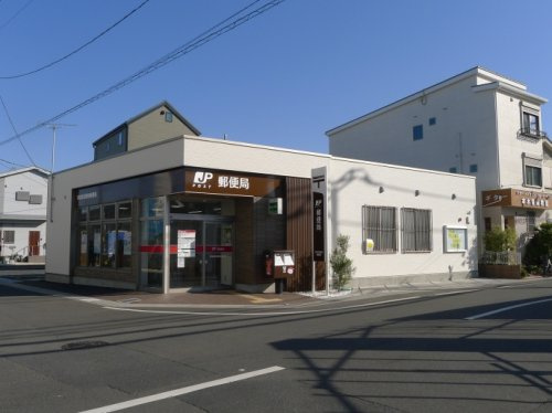 【郵便局】草加新田駅前郵便局まで86ｍ