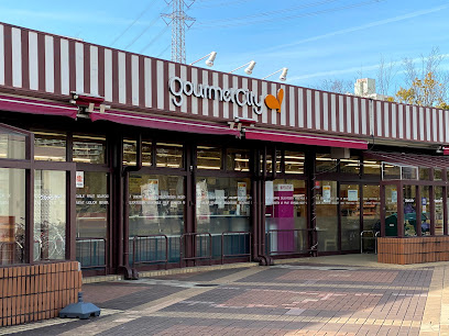 【スーパー】グルメシティ多摩店まで686ｍ