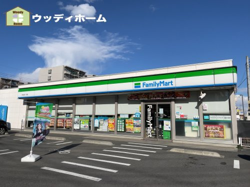 【コンビニエンスストア】ファミリーマート　千間台西一丁目店まで879ｍ
