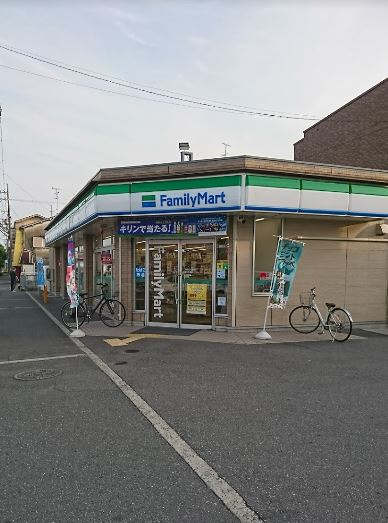 【コンビニエンスストア】ファミリーマート　枚方大橋店まで967ｍ