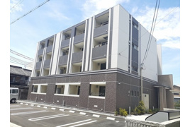 天理市川原城町のマンションの外観
