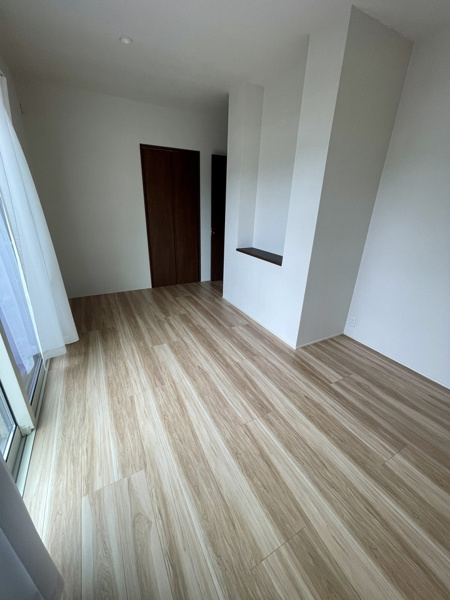 【津雲台6丁目テラスハウス貸家の居間】
