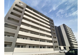 直方市大字下新入のマンションの外観