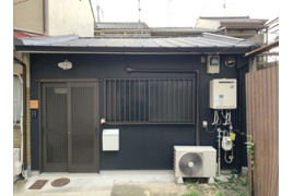 京都市上京区仁和寺街道千本東入の戸建ての外観