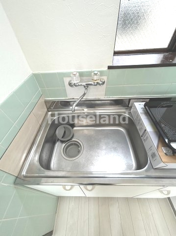 【ルピナスかつらぎA棟のキッチン】