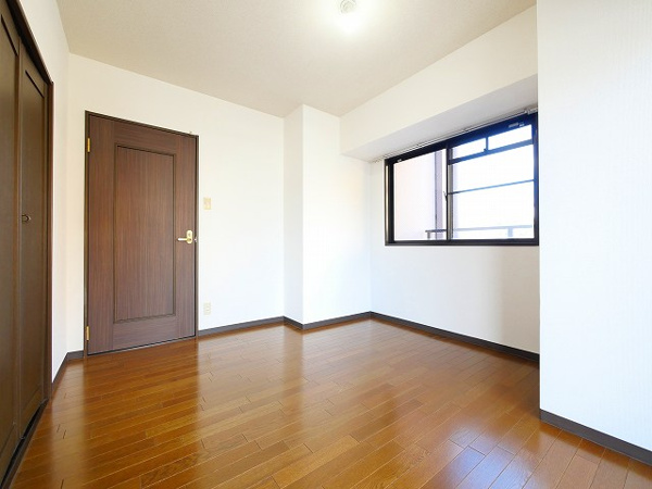 グリーンコーポ東生駒の洋室