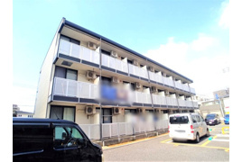 ルームス北越の外観