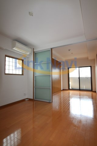 【リーガル新福島の居間】