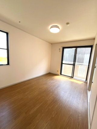 コーポ池まち花やしきの洋室