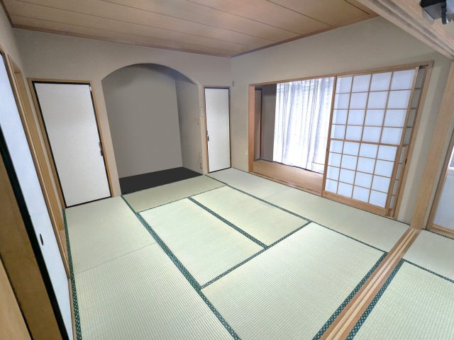 まるで旅館の一室のような広がりが魅力。畳の風合いと、縁側へと続く空間が、贅沢な寛ぎをもたらします。　