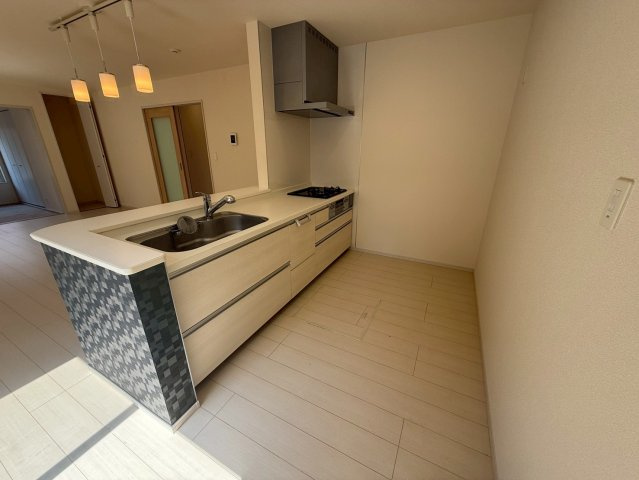 リビングとつながる対面式で、家族との会話もはずみます。