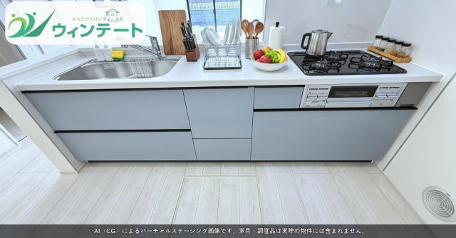 リビングとつながる対面キッチンは、家族の会話が弾む人気のスタイル。明るく清潔感のあるデザインです。