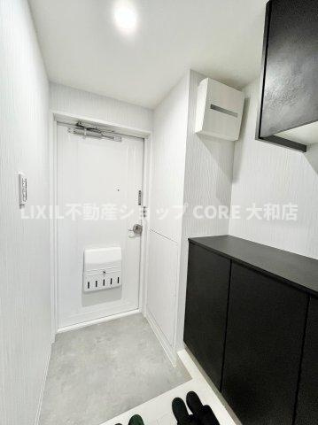 お客様をお迎えする玄関は落ち着いた雰囲気。誇りと喜びを感じる玄関まわりです。