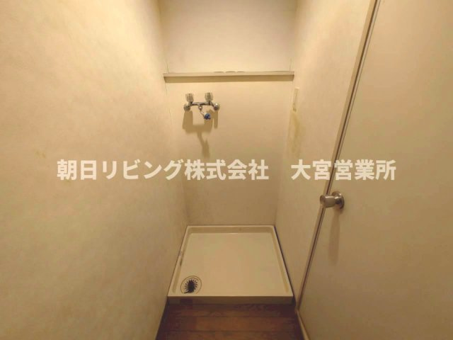 洋室15帖の洗濯機置場