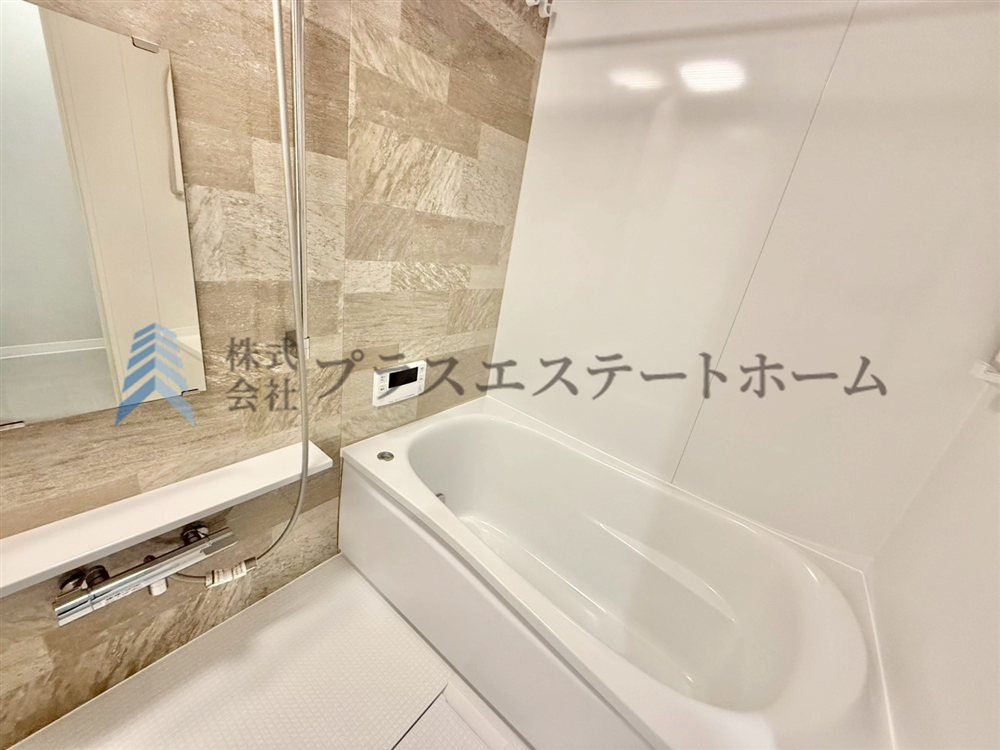 【同社施工事例】優しい色合いのアクセントパネルが施されており、リラックス感が漂います♪