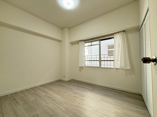 コム古川橋の寝室