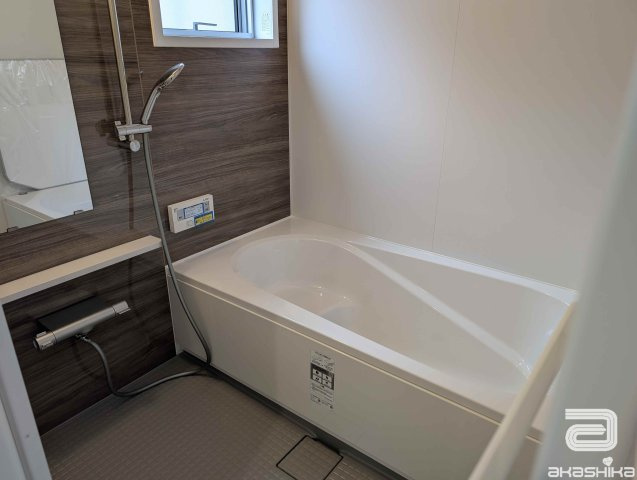一日の疲れを癒す、ゆったりサイズのバスルーム。