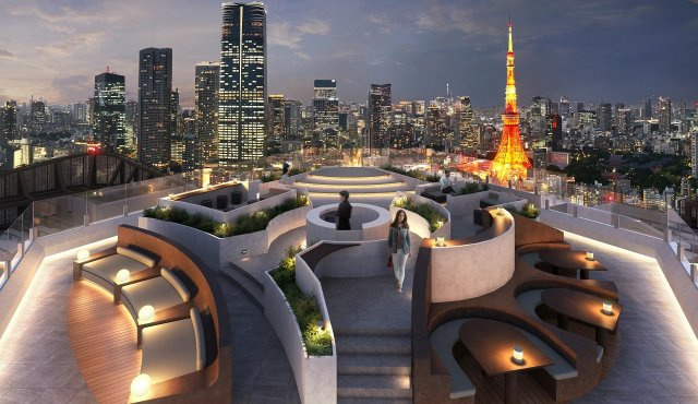 東京タワーと都心の煌めく夜景を一望するルーフトップテラス。流線型の美しいソファと洗練された照明が灯り、夜空の下で心地よい風を感じながら特別なひとときを堪能できる極上の屋外共用空間です。