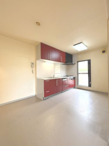 【グリーンメゾン南大沢　リビングを中心にした団らん設計 の居間】