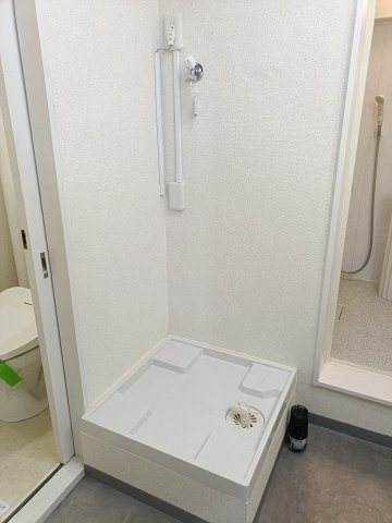 ダイニングキッチンとつながる洗面室で家事動線がスムーズに。